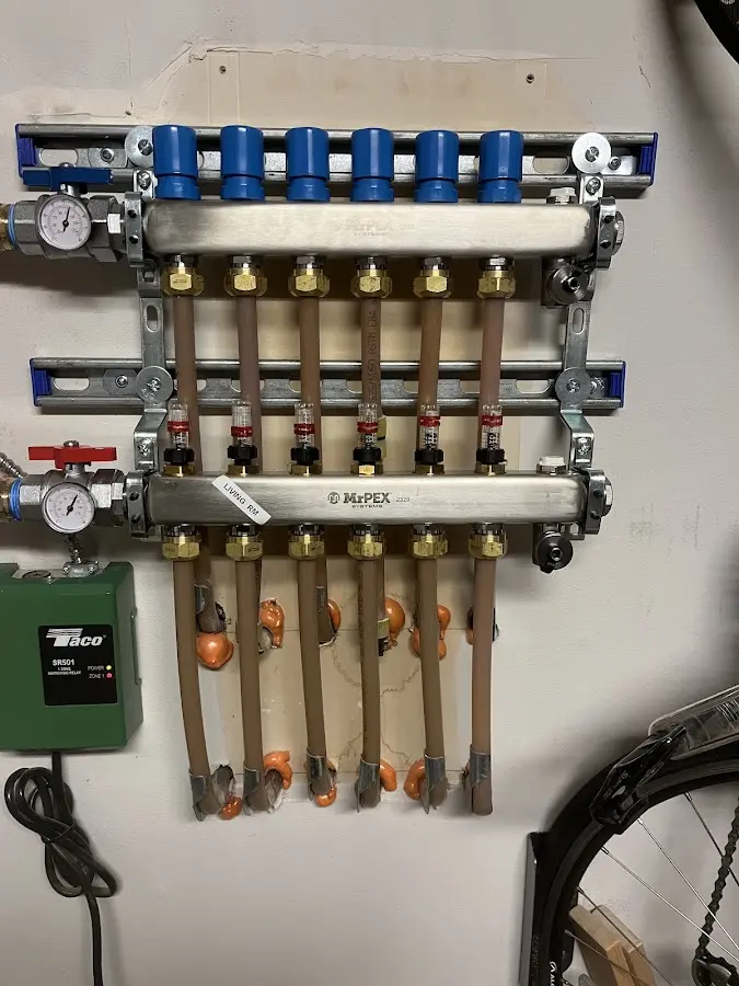 Plumber performing Water Heater Repair at a residential property in Big Stone Gap